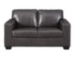 Ashley Morelos Gray Leather Loveseat small image number 1