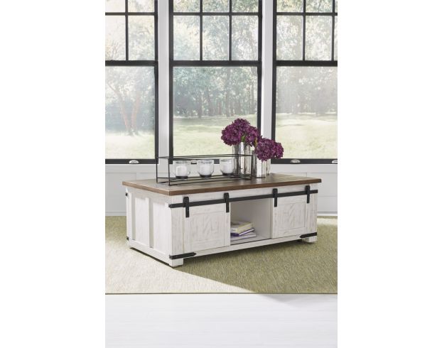 Ashley Wystfield Coffee Table with Sliding Doors large image number 2
